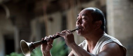 在寂寞中孤独前行 ——运用传统文化符号浅析《百鸟朝凤》中人物形象